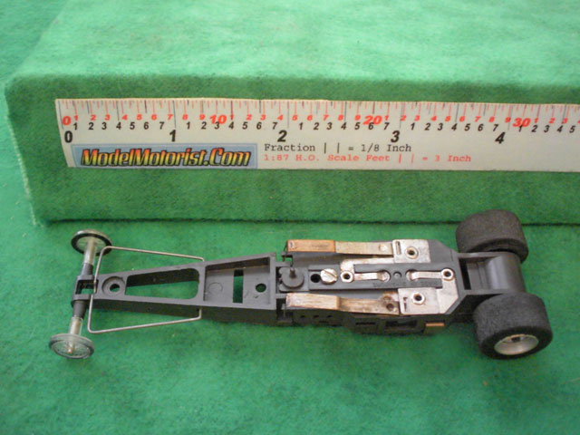 Bottom view of Aurora AFX Dragster Slot Car Chassis (pre Magna-Traction)