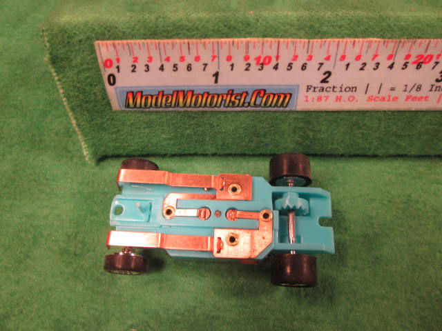 Bottom view of Dash Turquoise HO Slot Car Chassis