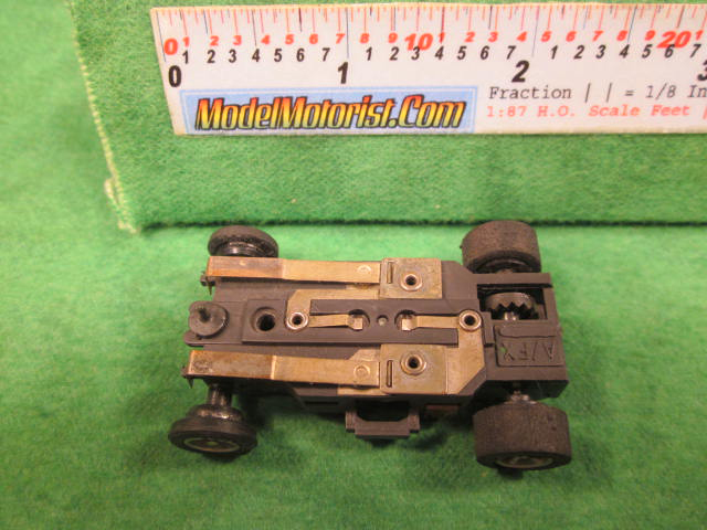 Bottom view of Aurora AFX Super-Traction Slot Car Chassis (pre Magna-Traction)
