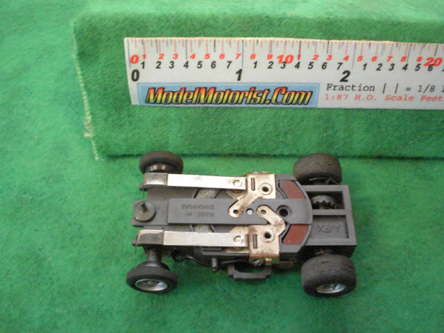 Bottom view of Aurora AFX Magna-Traction Flamethrower Slot Car Chassis