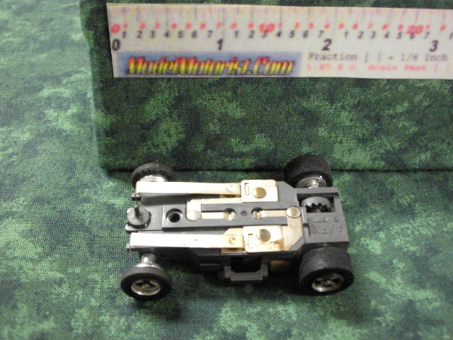 Bottom view of Aurora AFX 1971 Dated Slot Car Chassis (pre Magna-Traction)