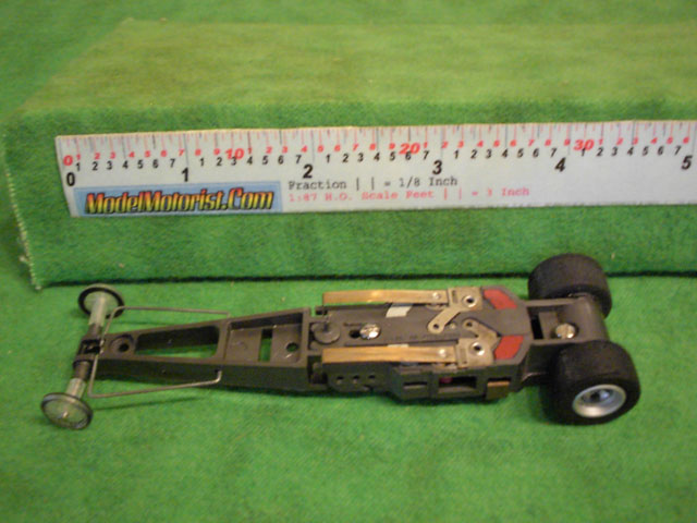 Bottom view of Aurora AFX Magna-Traction Specialty Dragster Slot Car Chassis