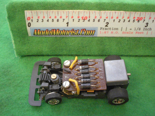 Top view of Aurora Speed-Steer Jam HO Slotless Car Chassis