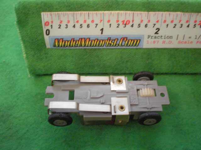 Bottom view of Atlas HO Scale Slot Car Chassis
