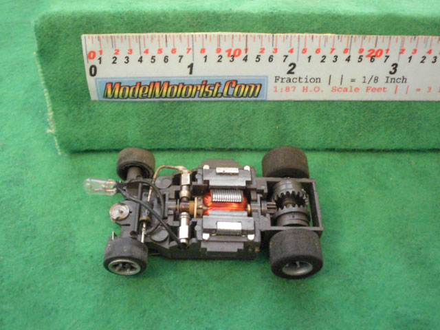 Top view of Aurora AFX Cat's Eyes Slot Car Chassis