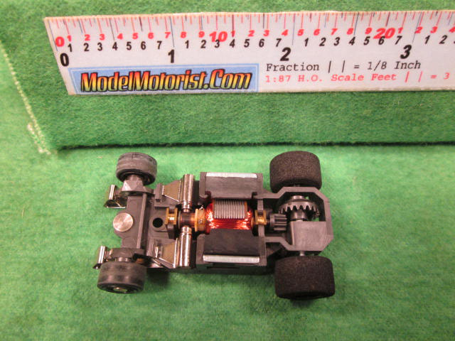 Top view of Aurora AFX G-Plus Narrow Snap-In Axle Slot Car Chassis