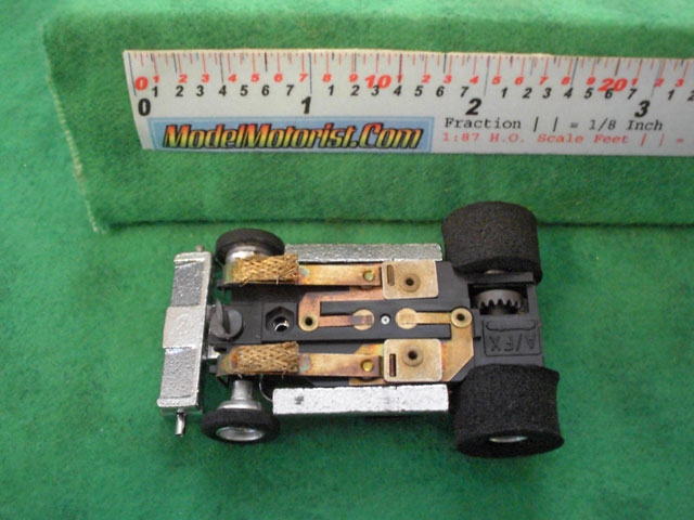 Bottom view of Aurora Super II Slot Car (boxed kit) Chassis (pre Magna-Traction)
