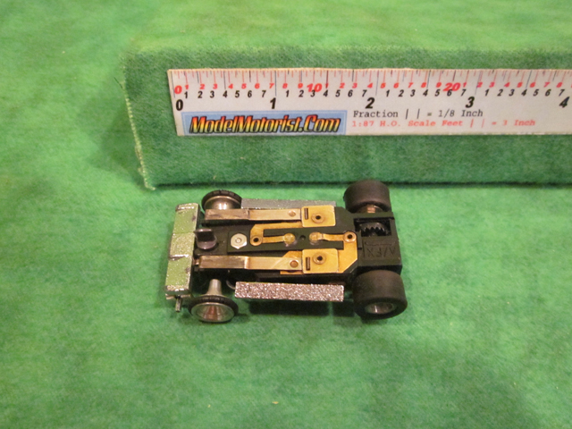 Bottom view of Aurora Super II Slot Car Chassis (pre Magna-Traction)