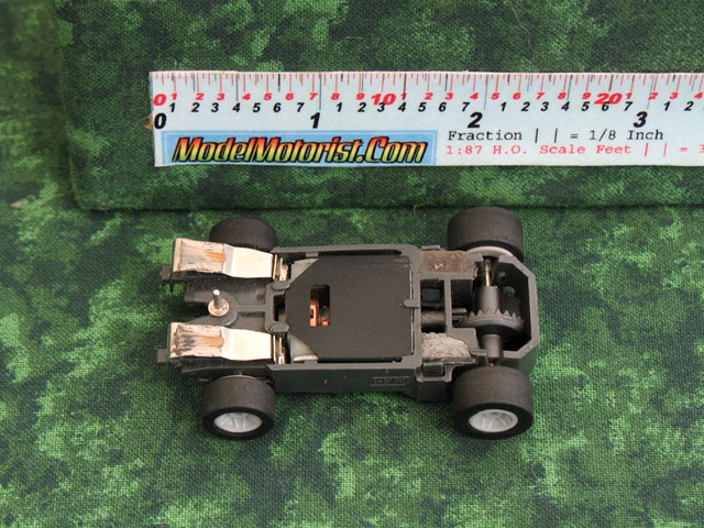 Bottom view of Empire MR1 Racing No Mount HO Slot Car Chassis