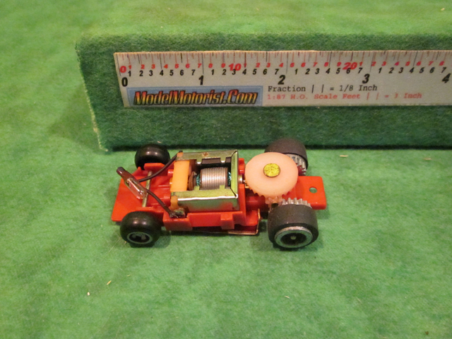 Top view of Ideal Passing MK2 Red B HO Slotless Car Chassis