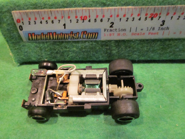 Top view of Ideal Lighted Bi-Directional HO Slot Car Chassis