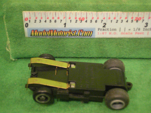 Bottom view of Ideal Bi-Directional HO Slot Car Chassis