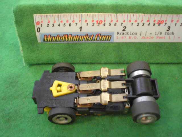 Bottom view of Ideal Zig-Zag Jam HO Slotless Car Chassis