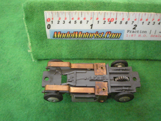 Bottom view of Lionel HO Slot Car Chassis (Gray)