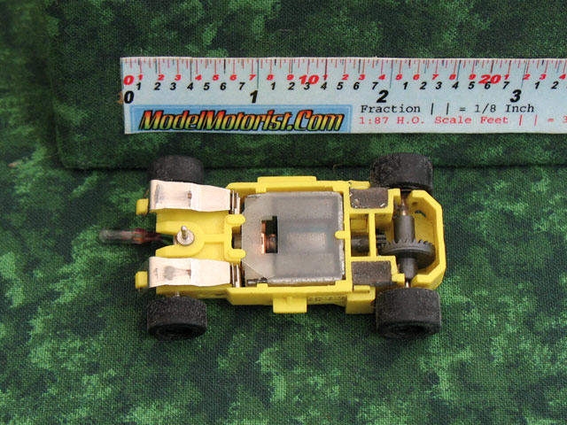 Bottom view of MR1 Lighted Yellow HO Slot Car Chassis