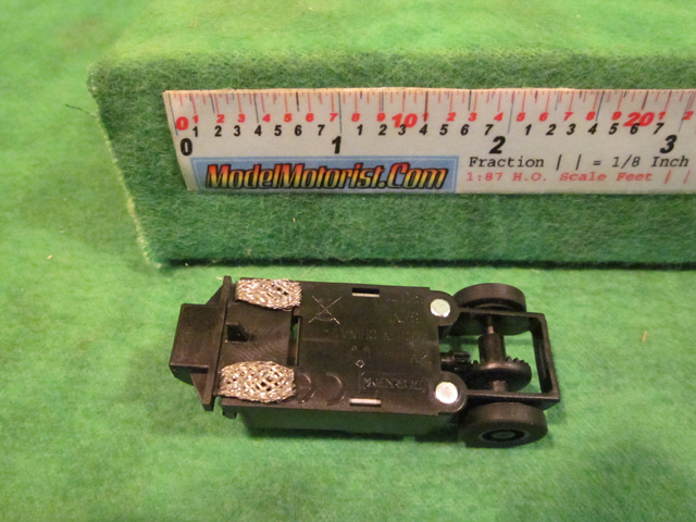 Bottom view of MicroScalextric Bicycle HO Slot Car Chassis