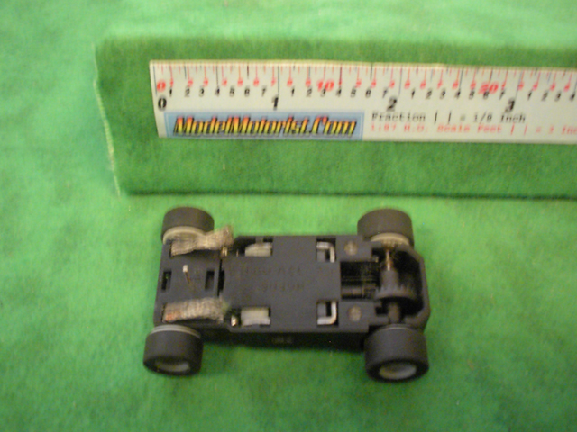 Bottom view of MicroScalextric Narrow Mount HO Slot Car Chassis