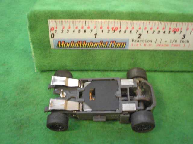 Bottom view of Empire MR1 Racing HO Slot Car Chassis
