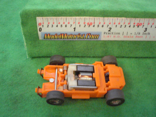 Top view of MR1 Racing Orange HO Slot Car Chassis