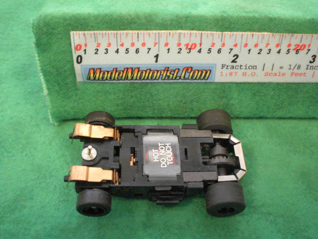 Bottom view of Aurora Tomy Super G+ with Metal Clip Slot Car Chassis