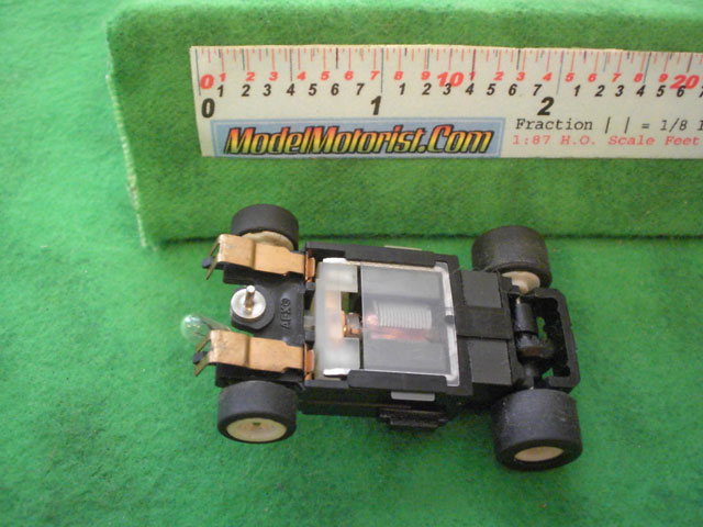 Bottom view of Aurora Tomy Lighted Turbo Slot Car Narrow Chassis