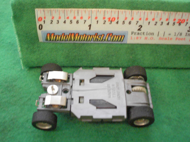Bottom view of Tyco HP-2 Curve Hugger HO Slot Car Chassis
